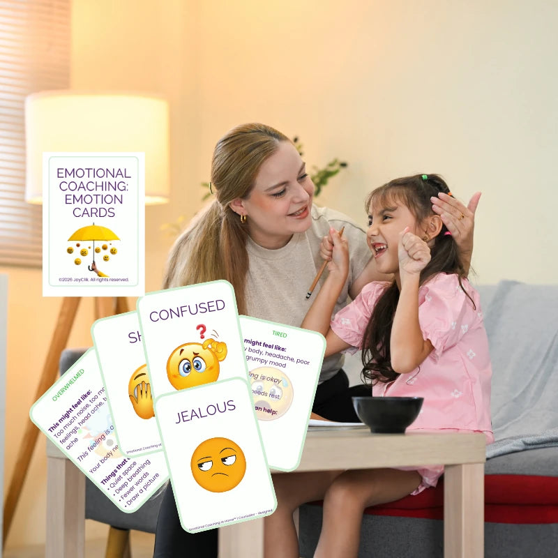 Woman and child playing with printable Emotion Coaching at Home™ emotion cards in a cozy room.