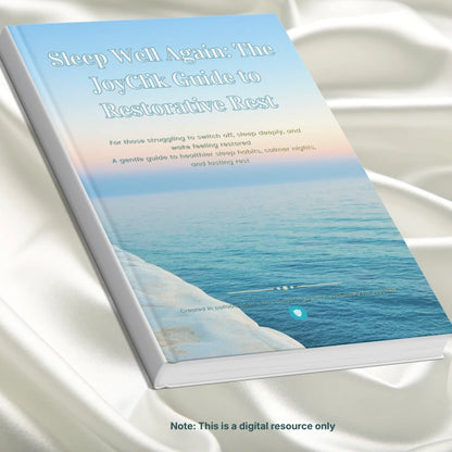 a home printed digital resource titled 'Sleep Well Again: The JoyClik Guide to Restorative Rest' on a white surface with a beach scene cover.